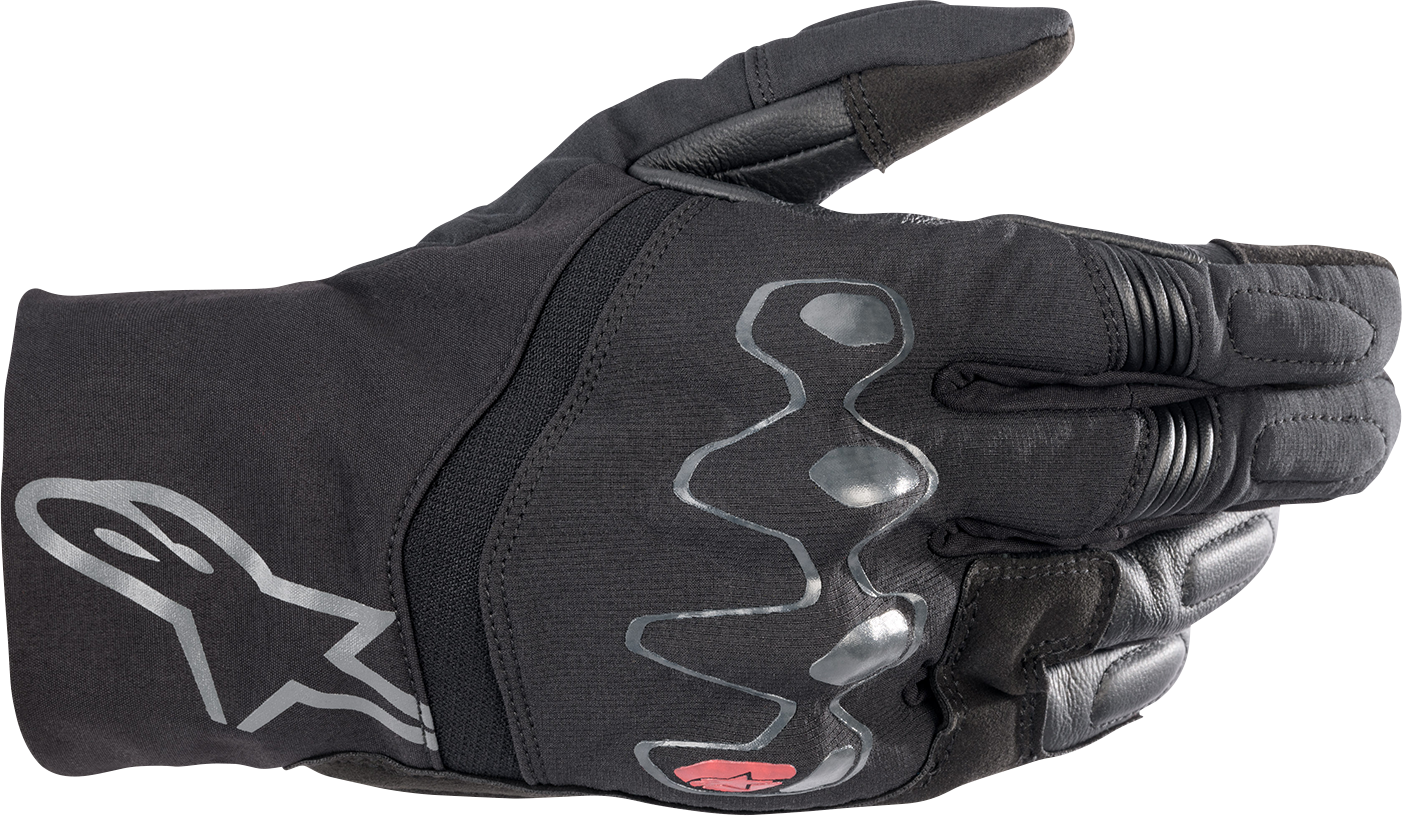 Alpinestars Hyde XT DrystarXF® Black motorcycle gloves in medium size, featuring protective knuckles and adjustable wrist straps.