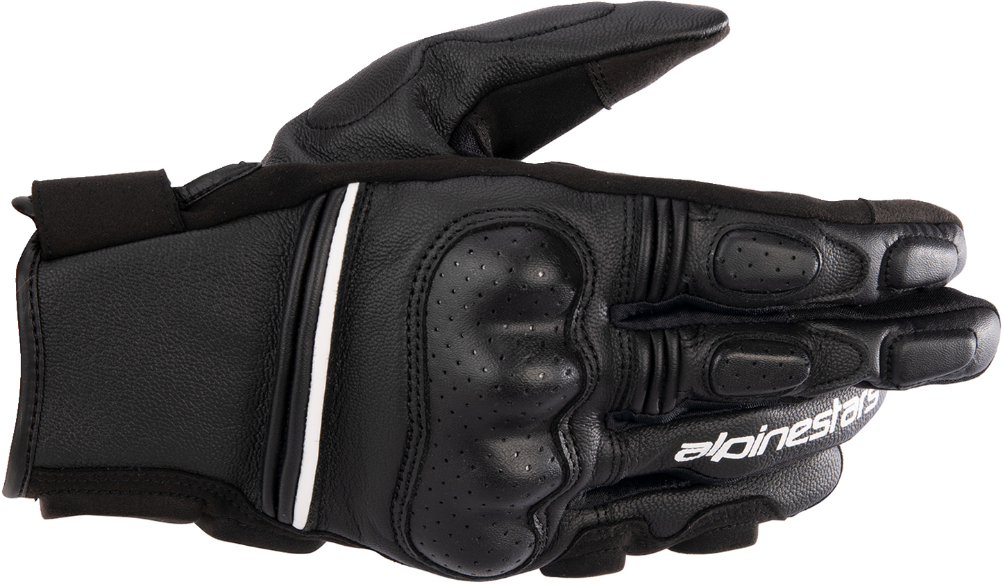 Alpinestars Phenom motorcycle gloves in black and white, 2XL size, featuring protective padding and durable synthetic leather.