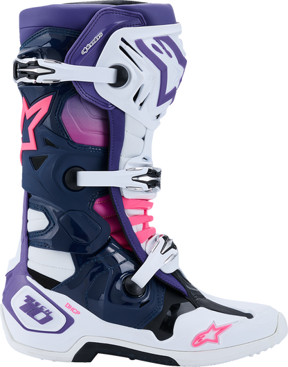 Alpinestars Tech 10 motocross boots in white, violet, navy, and pink fluorescent with US 11 size and sturdy design.