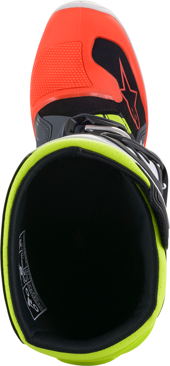 Alpinestars Youth Tech 7S bike boots in black, gray, red, white, and yellow with protective design and adjustable straps.