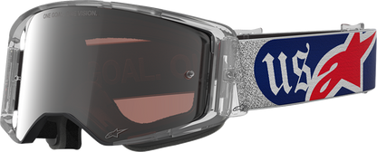Alpinestars Supertech Goggle Merica 25 with red, blue, silver, and copper accents, designed for motocross racing.