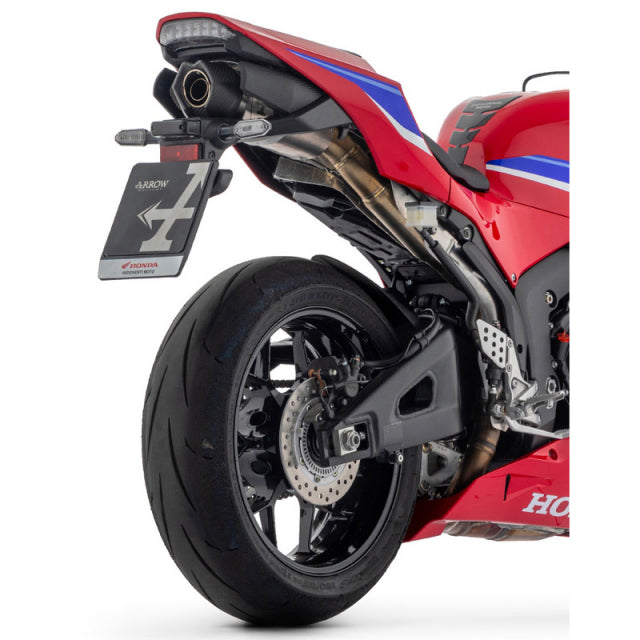 Dark aluminum Arrow Indy Race Exhaust for Honda CBR600RR 2024-2025 motorcycle, sleek and aerodynamic with brand branding.