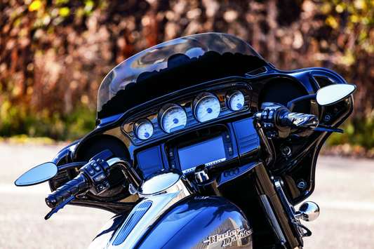 Kuryakyn Tri-Line Inner Fairing Cover Plates for Harley Davidson motorcycle, featuring sleek silver design and detailed finish.