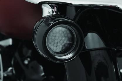 Kuryakyn Luminez LED front turn signal insert in amber for Harley-Davidson motorcycles, designed for 1157 bulb sockets.
