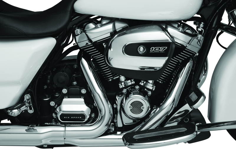 Kuryakyn Milwaukee-8 Chrome Starter Cover for Harley-Davidson motorcycle engine, shiny chrome finish, detailed design.