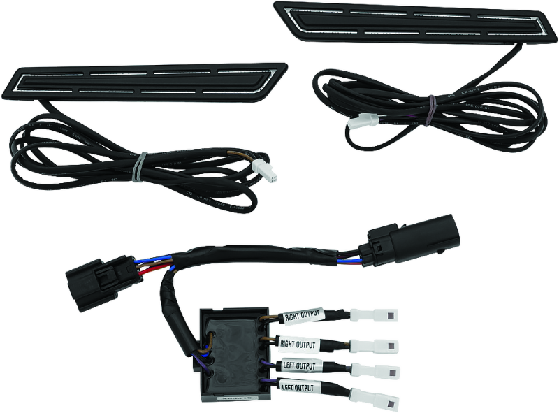 Kuryakyn LED saddlebag hinge accents for Harley Davidson with bright red run, brake, and turn signal lights on a motorcycle.