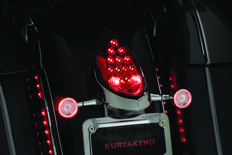 Kuryakyn custom rear turn signal and license plate mount installed on Indian motorcycle with sleek design and durable finish