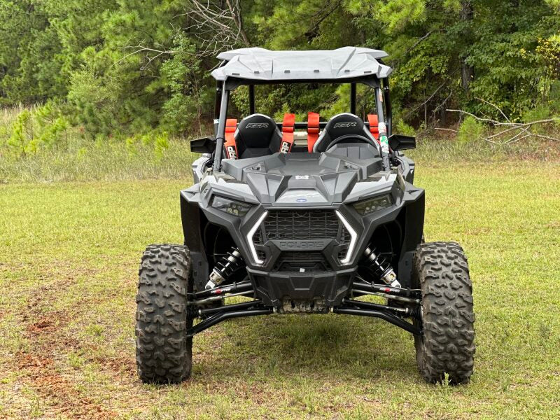 Seizmik Polaris RZR 900-1000 XP composite roof, rugged off-road vehicle accessory, shown installed on side view of Polaris RZR.