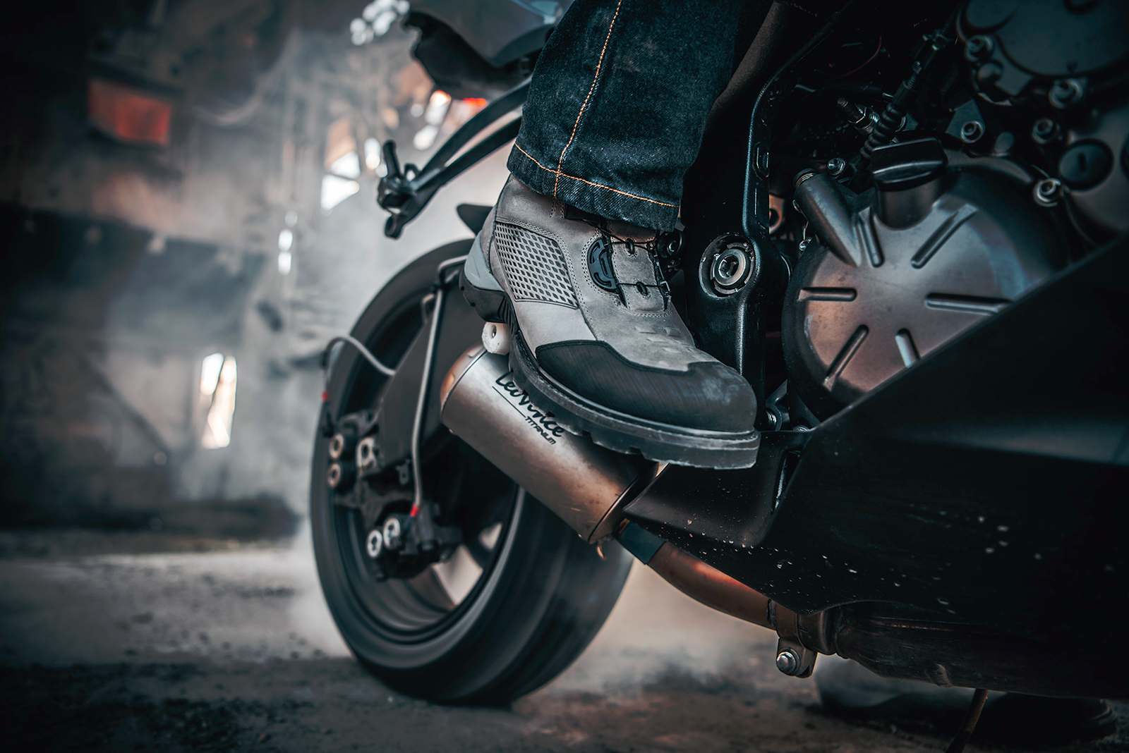 Gray ICON Stormhawk Boots by Bill's Exhausts, size 10, showcasing the sturdy leather construction and rugged design.
