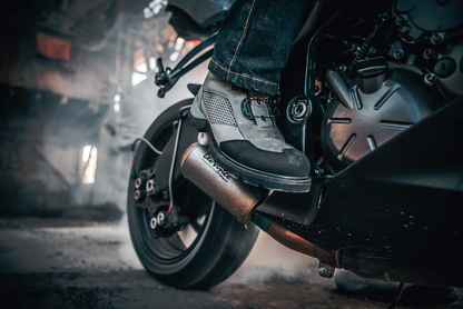 Gray ICON Stormhawk Boots by Bill's Exhausts, size 10, showcasing the sturdy leather construction and rugged design.
