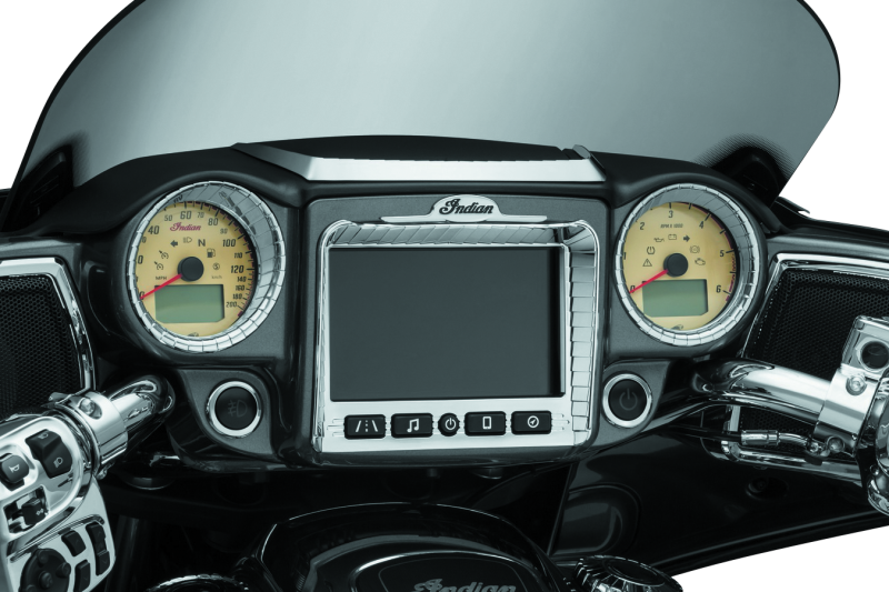 Kuryakyn Aztec gauge accent in chrome for 2014-2023 Indian motorcycle models, mounted on the dashboard.