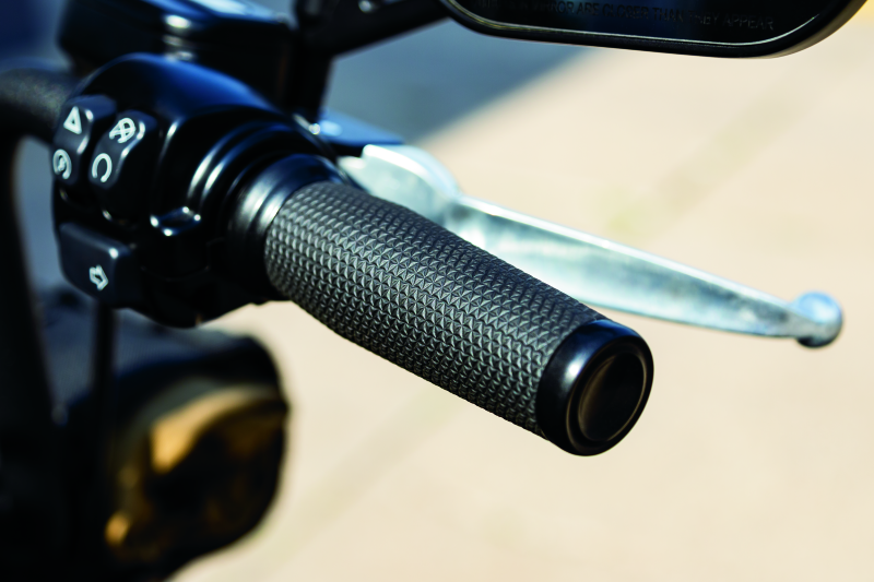 Kuryakyn Thresher grips for throttle-by-wire motorcycles, black ergonomic powersports hand grips with shark tooth knurling design