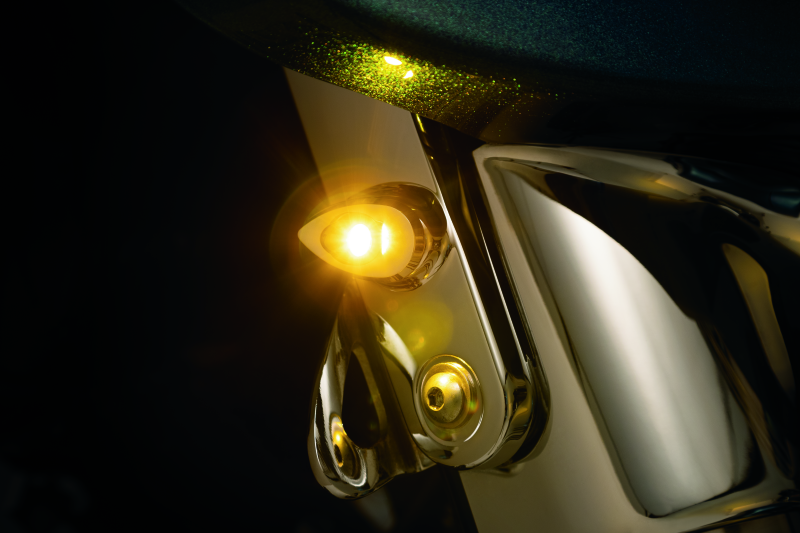Kuryakyn Kellerman Atto clear lens amber chromed motorcycle LED light with compact design and chrome finish.
