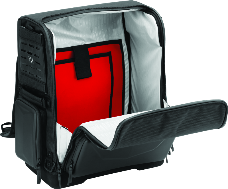 Kuryakyn Xkursion XS Odyssey motorcycle luggage bag with black nylon exterior and adjustable straps for secure travel.