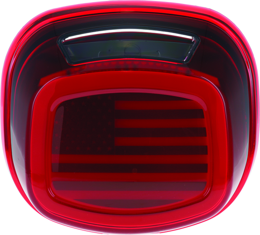 Kuryakyn Freedom taillight with red lens and license plate illumination for Harley Davidson motorcycle.