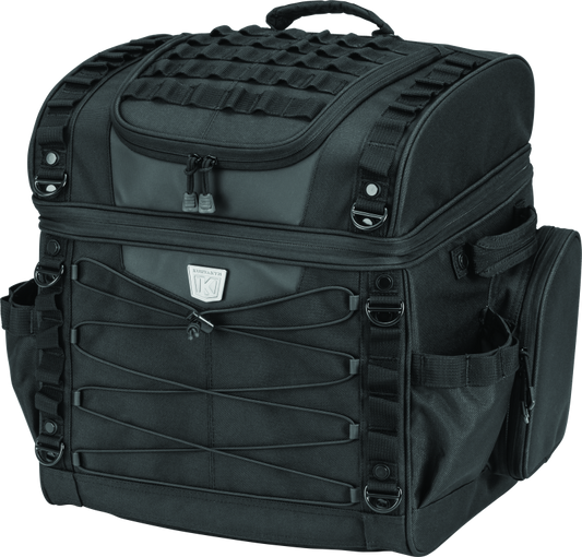 Kuryakyn Momentum Vagabond Bag mounted on motorcycle seat and luggage rack, showcasing versatile storage for motorcycle touring.
