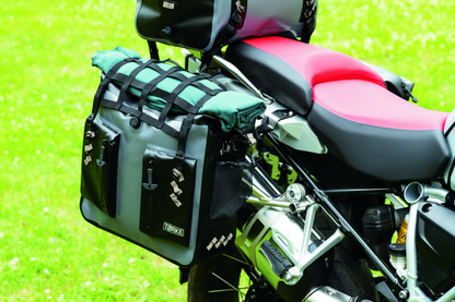 Kuryakyn Torke 24L waterproof dry bag panniers for power sports, showing the durable, secure storage solution for motorcycles.