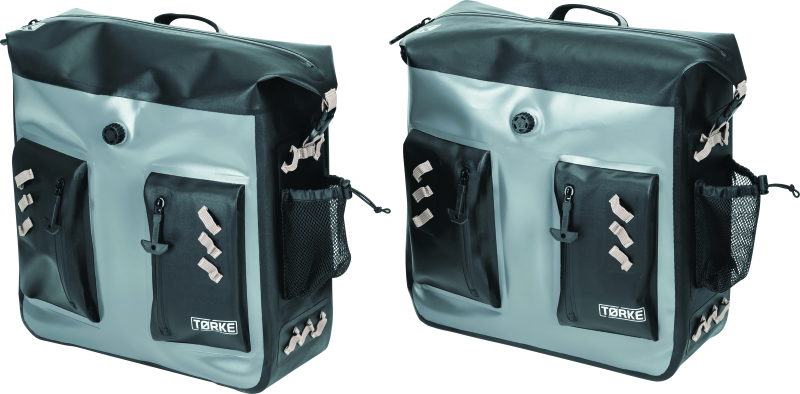 Kuryakyn Torke 24L dry bag panniers on a motorcycle, waterproof power sports storage solution with secure straps