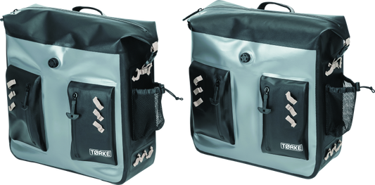 Kuryakyn Torke 24L dry bag panniers on a motorcycle, waterproof power sports storage solution with secure straps