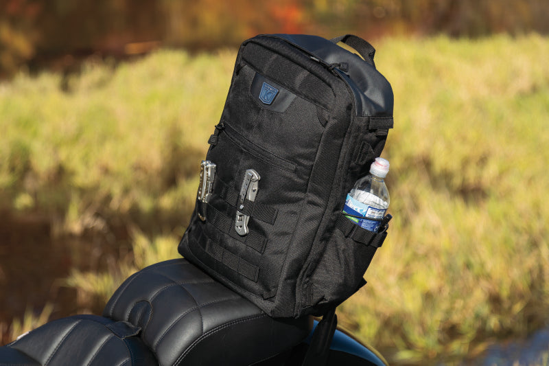 Kuryakyn Momentum Runaway Backpack for powersports and daily commuting, shown with adjustable straps and durable black material.