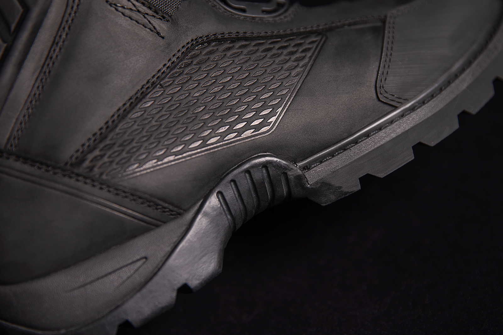 Black ICON Stormhawk Boots in size 11.5 with sturdy design and rugged sole, from Bill's Exhausts.