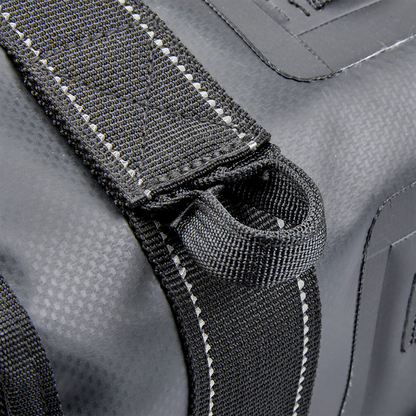 Black BILTWELL EXFIL-36 saddlebags on motorcycle, showcasing rugged, durable bag design with secure straps and storage compartments