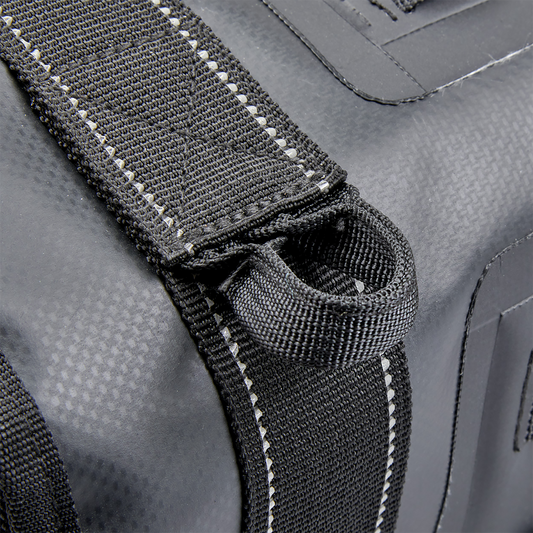 Black BILTWELL EXFIL-36 saddlebags on motorcycle, showcasing rugged, durable bag design with secure straps and storage compartments