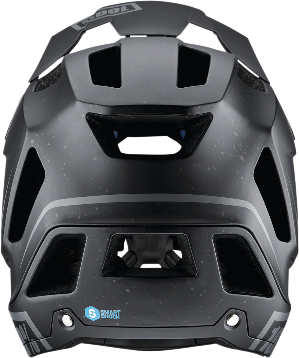 Black 100% Trajecta bicycle helmet with Fidlock strap, medium size, designed for safety and comfort by Bill's Exhausts.