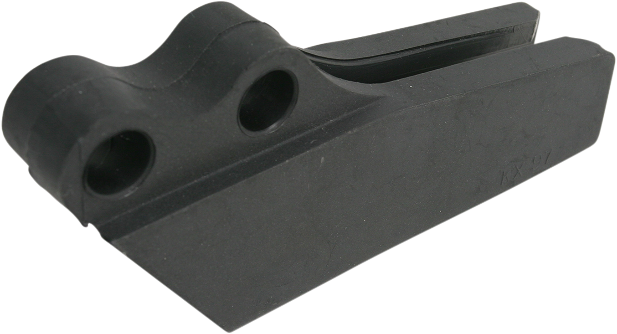 Acerbis Kawasaki chain guide in black, designed for Kawasaki bikes, shown installed on a motorcycle's chain and body.