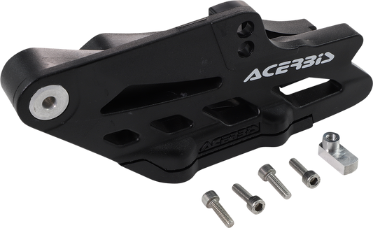 A black Acerbis complete chain guide block for KTM, Gas Gas, Husqvarna, and Sherco motorcycles, showing the body and mounting points.