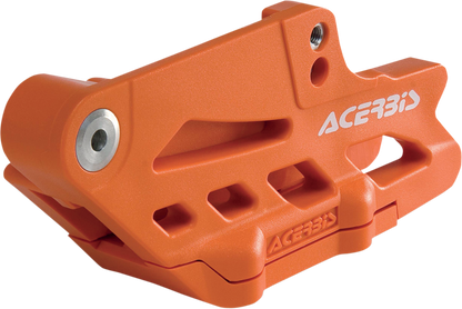 Orange Acerbis complete chain guide block for KTM, Gas Gas, Husqvarna, and Sherco bikes, mounted on motorcycle frame.