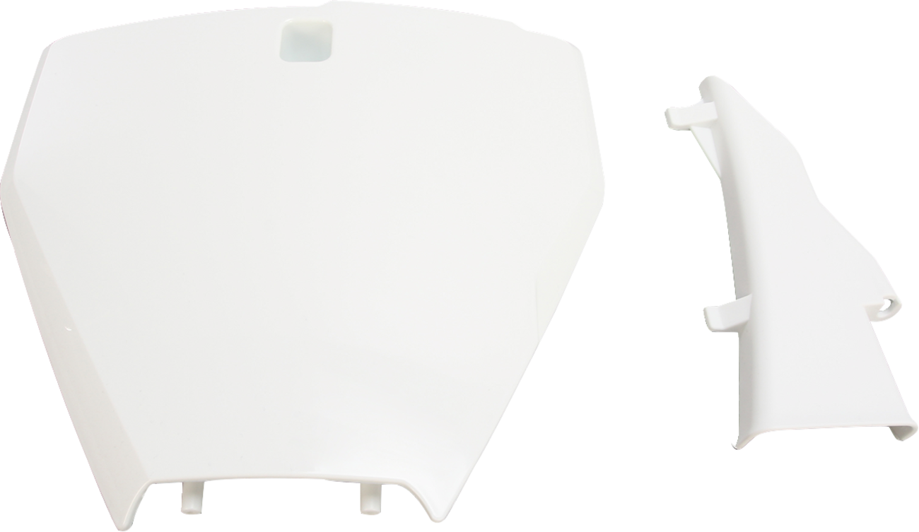 White Acerbis front number plate for motorcycles, mounted on a vehicle body, featuring clean design and branding details.