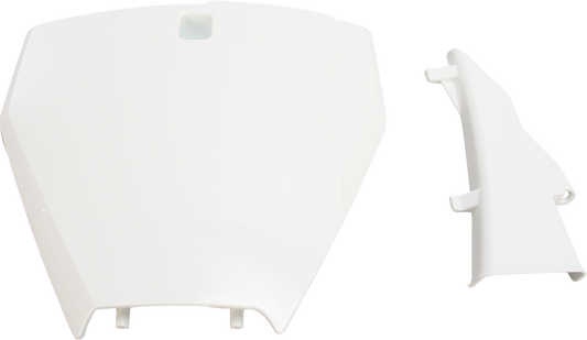 White Acerbis front number plate for motorcycles, mounted on a vehicle body, featuring clean design and branding details.