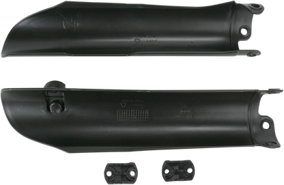 Acerbis black lower fork covers for inverted motorcycle forks, shown on a motorcycle fork assembly.