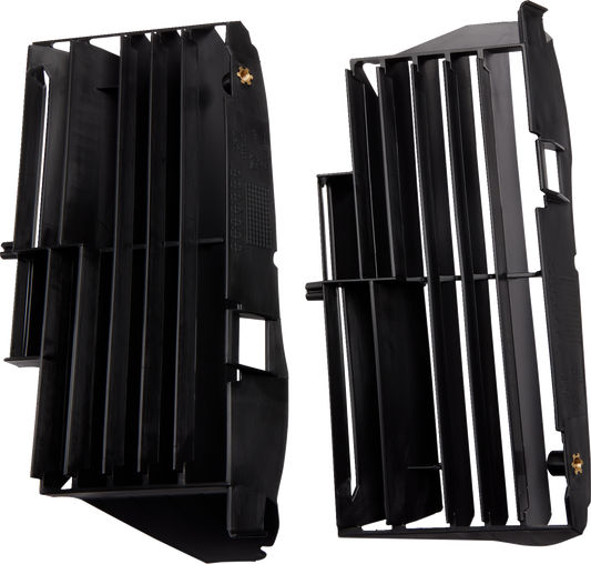 Black ACERBIS radiator louvers for YZ450F 2023 motorcycle, mounted on the body, with vented design for cooling and protection.