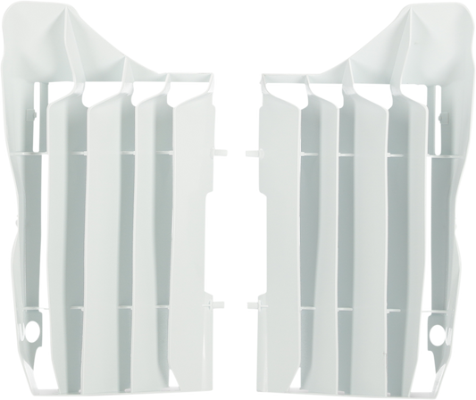 White ACERBIS radiator louvers for Honda motorcycle, body part designed for cooling and protection.