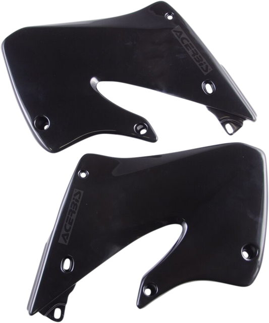 Black ACERBIS radiator shrouds for motorcycle body, designed for durability and style, with brand details visible.