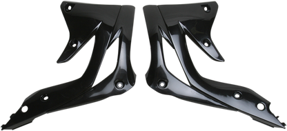 Black Acerbis radiator shrouds for motorcycle body, designed for durability and style, by Bill's Exhausts.