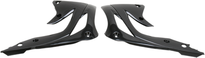 Black ACERBIS radiator shrouds for motorcycle body, designed for durability and style, by Bill's Exhausts.