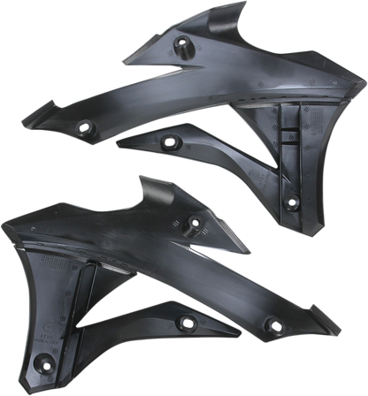 Black Acerbis radiator shrouds for motorcycle, featuring a sleek body design with brand-specific details.