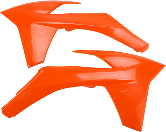 Orange Acerbis radiator shrouds for motorcycle, designed for body protection and style, by Bill's Exhausts.