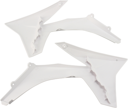 White ACERBIS radiator shrouds for motorcycle, designed for body protection and style, with brand details visible in the image.
