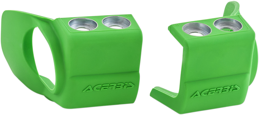 Green ACERBIS shoe protectors designed for inverted forks, shown on a motorcycle front suspension.