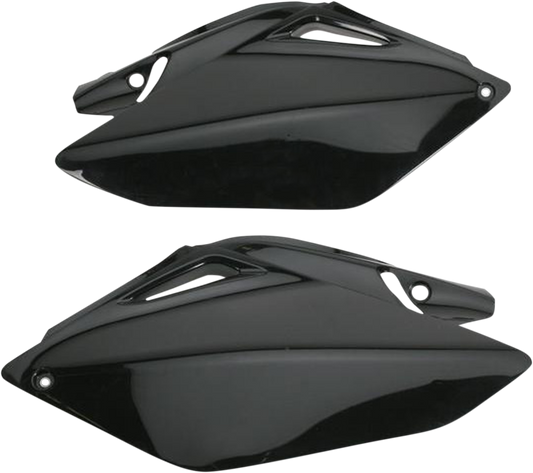 Acerbis black side panels for motorcycle body, designed for durability and style, shown on a vehicle with a sleek black finish.