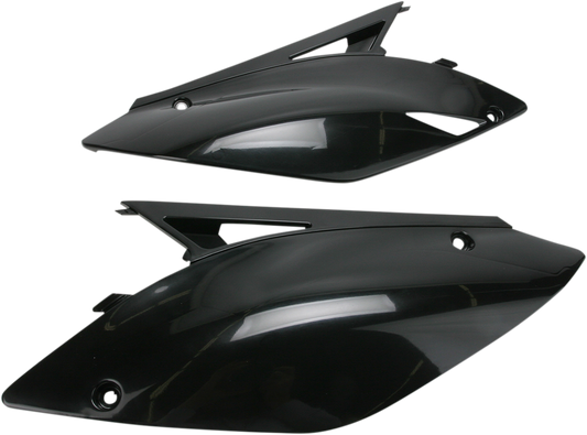 Acerbis black side panels for motorcycle body, featuring sleek black design, compatible with Acerbis models, displayed on a white background.