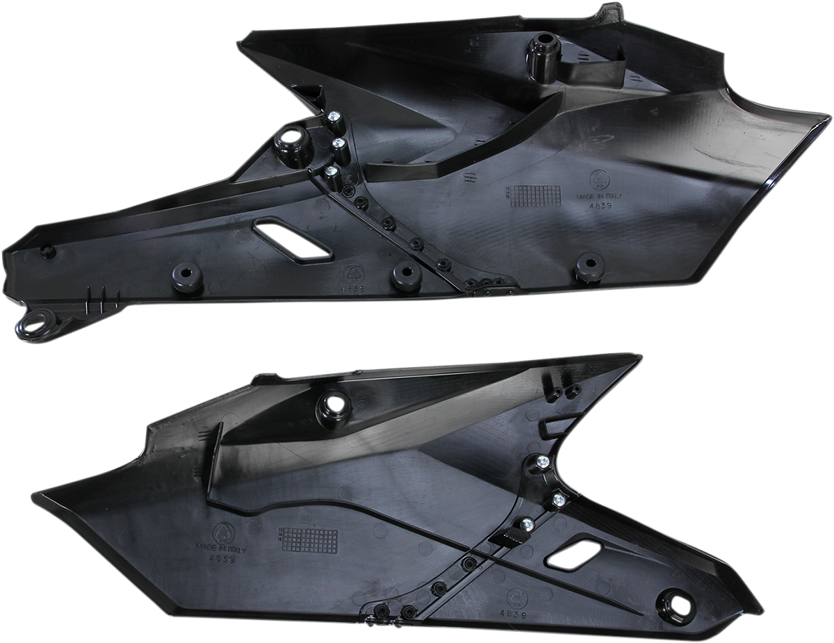 Black Acerbis side panels for motorcycle body, designed for durability and style, shown on a motorcycle in this image.