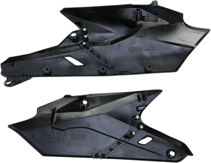 Black Acerbis side panels for motorcycle body, designed for durability and style, shown on a motorcycle in this image.