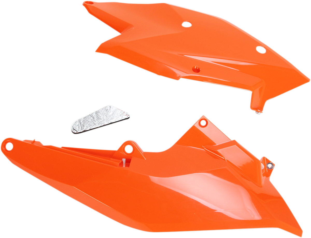 Orange Acerbis side panels for motorcycle body, featuring bold color and durable design, displayed on a clean background.