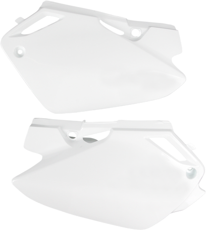White Acerbis side panels for motorcycle body, designed for durability and style, shown installed on a bike.
