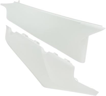 White Acerbis side panels for motorcycle body, designed for durability and stylish appearance.